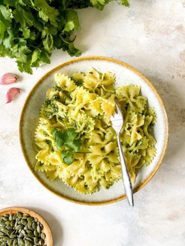 coriander pesto pasta in a bowl