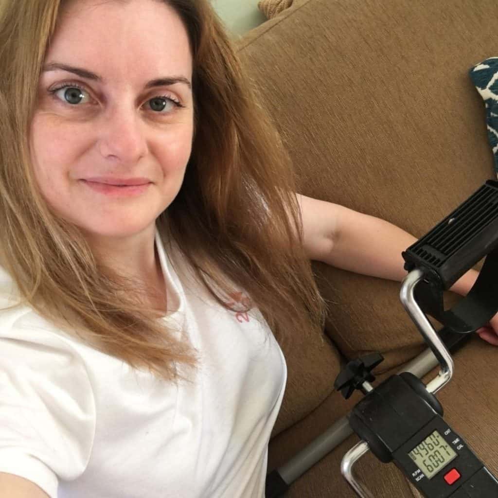 woman with a pedal exerciser
