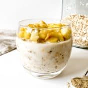 cardamom overnight oats with a jar of oats in the background