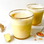 two glasses of iced turmeric latte.