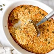 carrot cake baked oatmeal in a white ovenproof dish