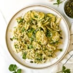 quinoa and fennel salad on a brown plate.