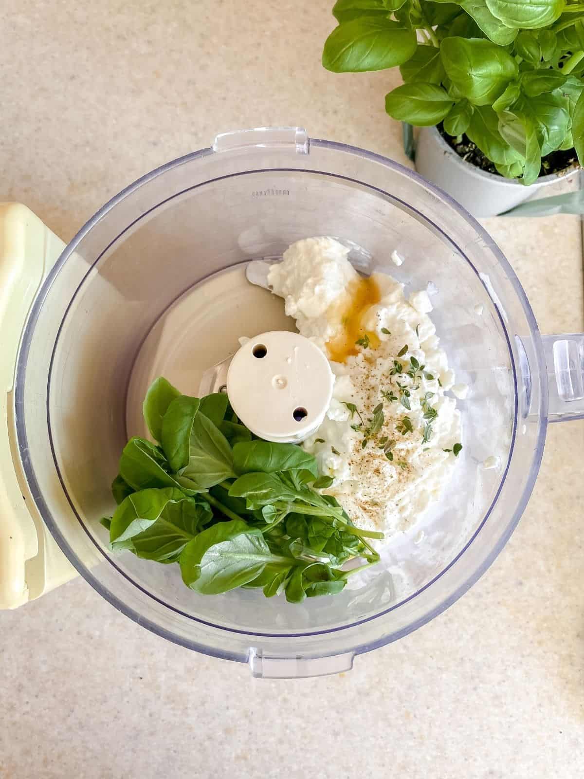 ricotta, honey and basil in a food processor.