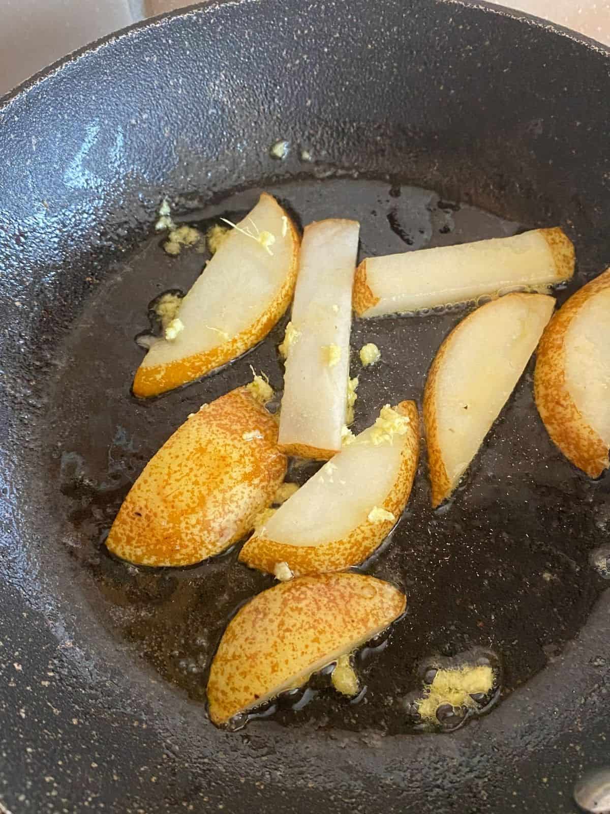 pears and ginger in a pan