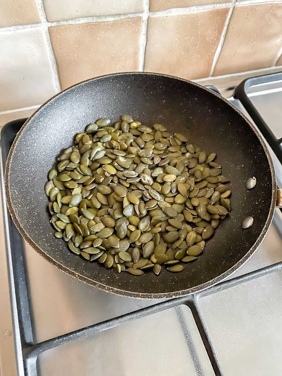 pumpkin seeds in a pan.