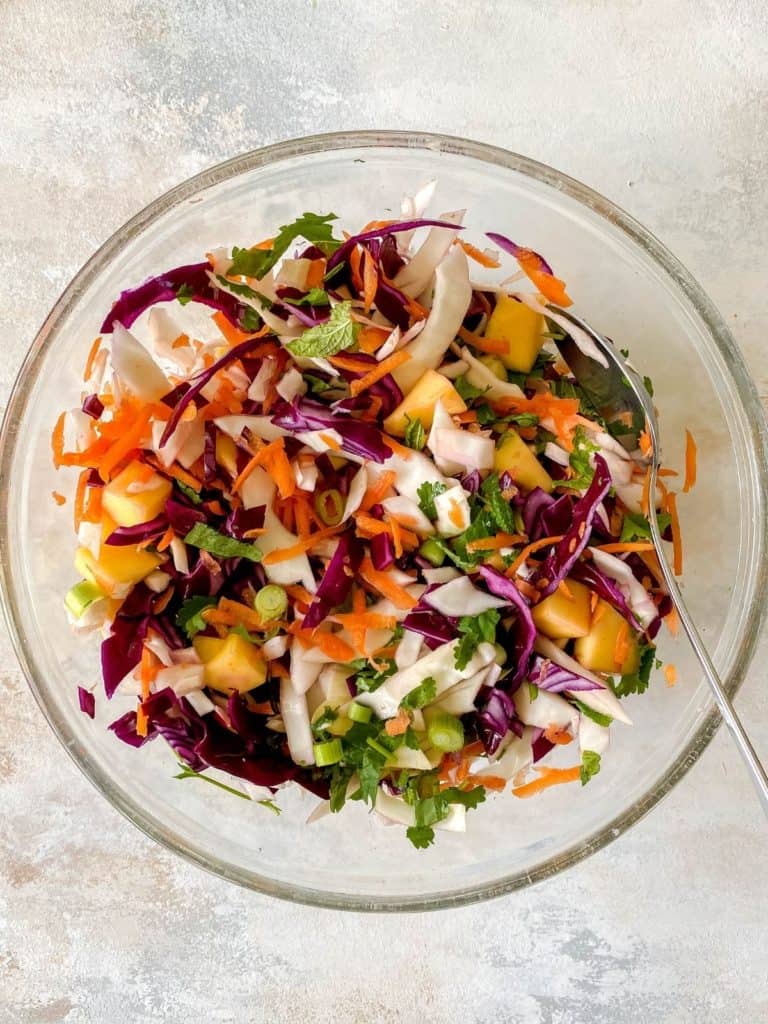 glass bowl of coleslaw.