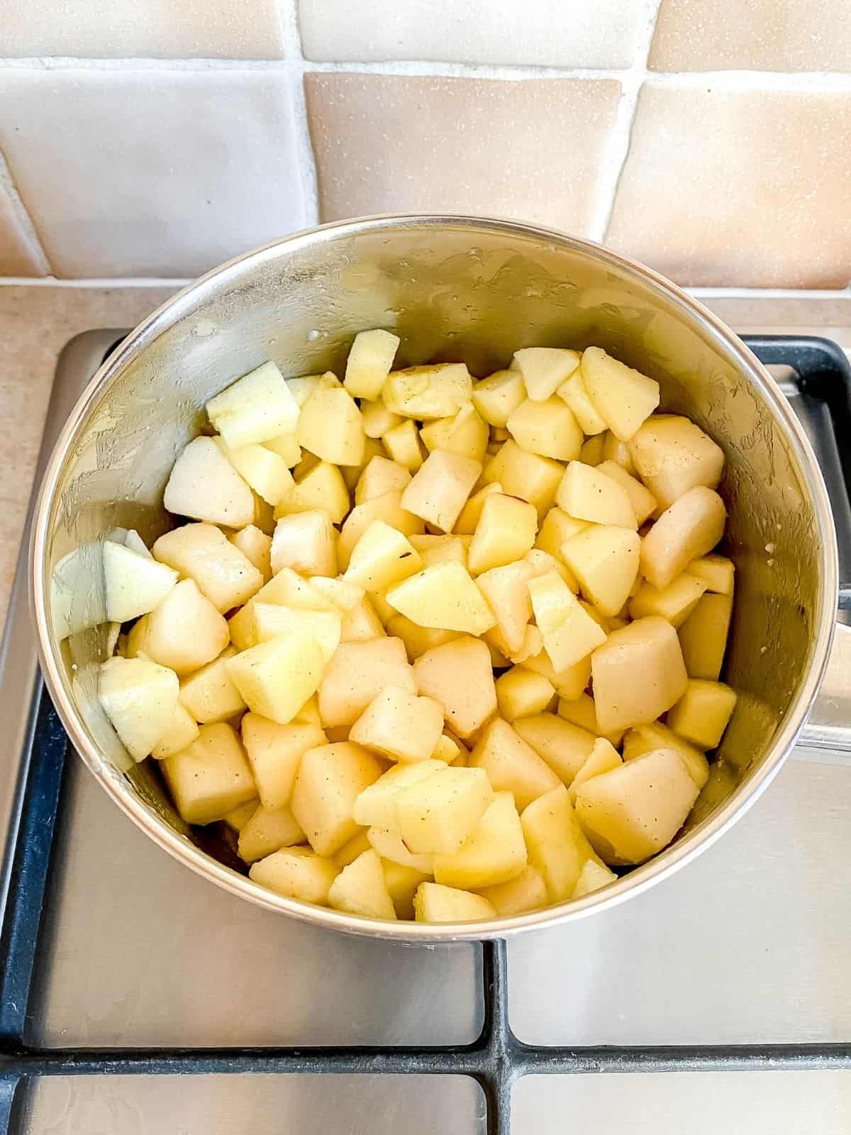 apple and pear in a pan.