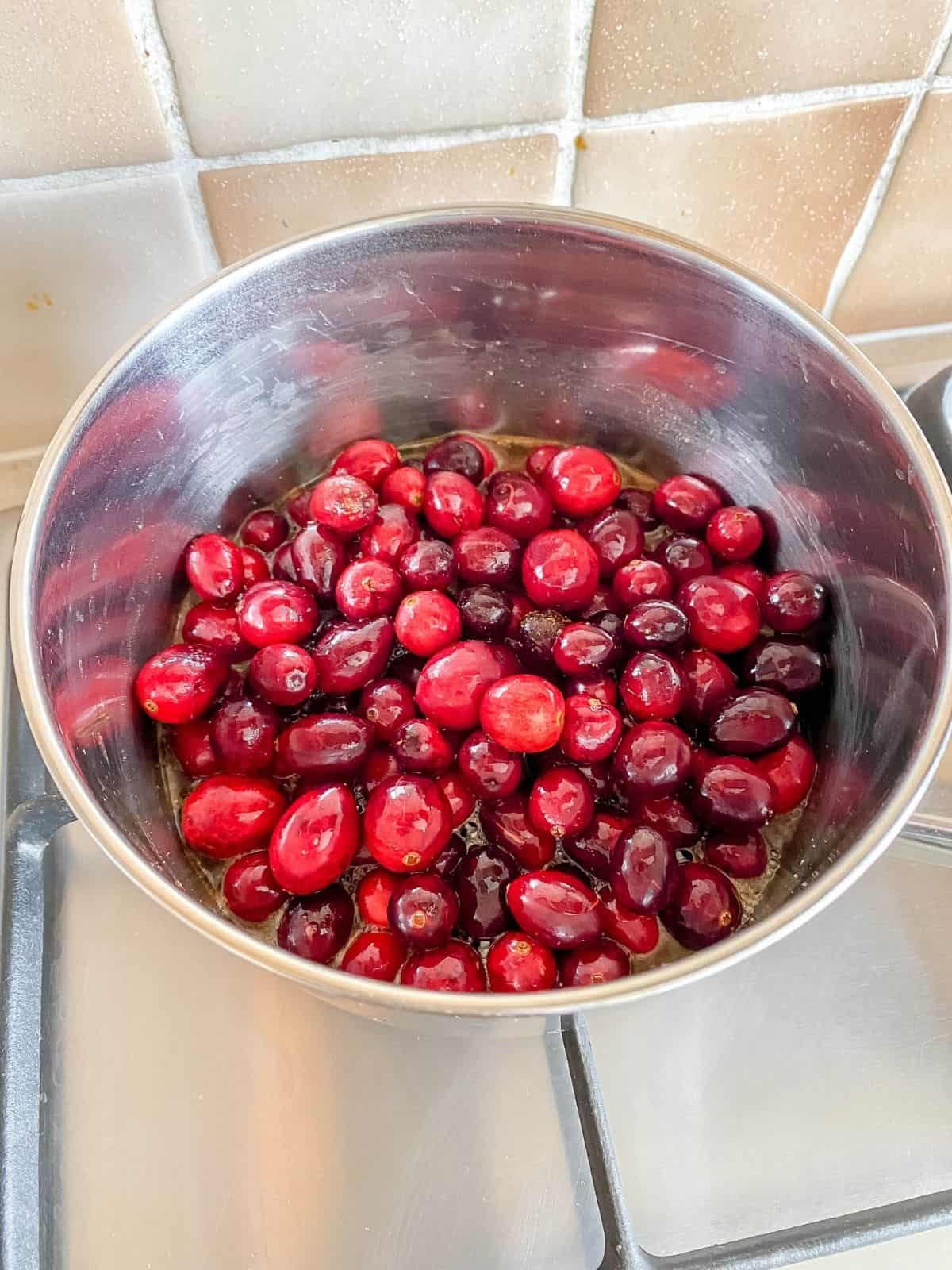 pan of cranberries on the stove top.