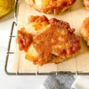 pear fritters on a wire rack.