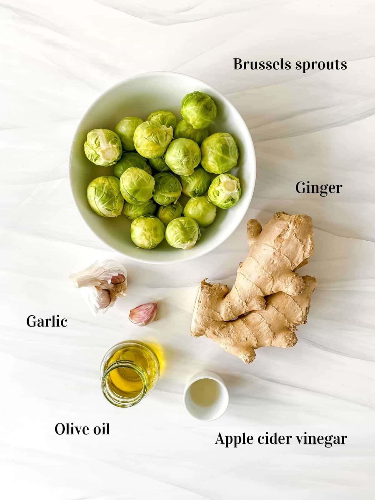 all the ingredients to make ginger brussels sprouts individually labelled.