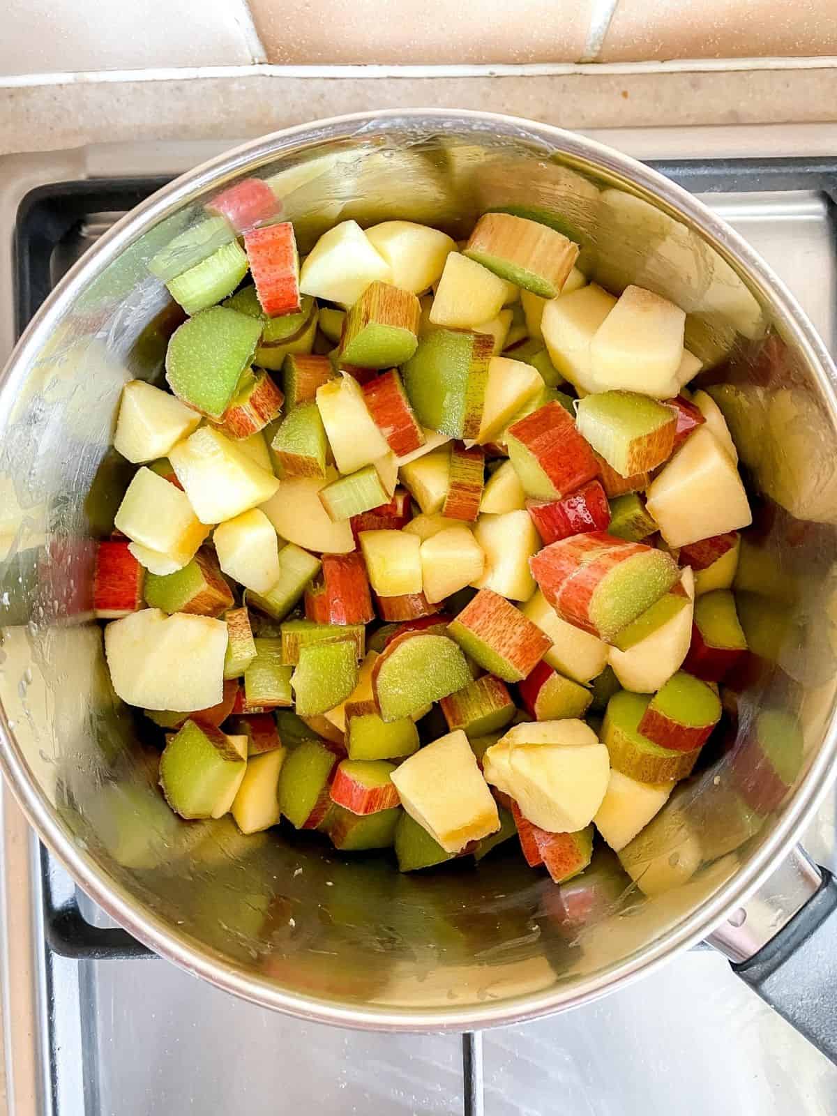 apple and rhubarb pieces in a large pan.