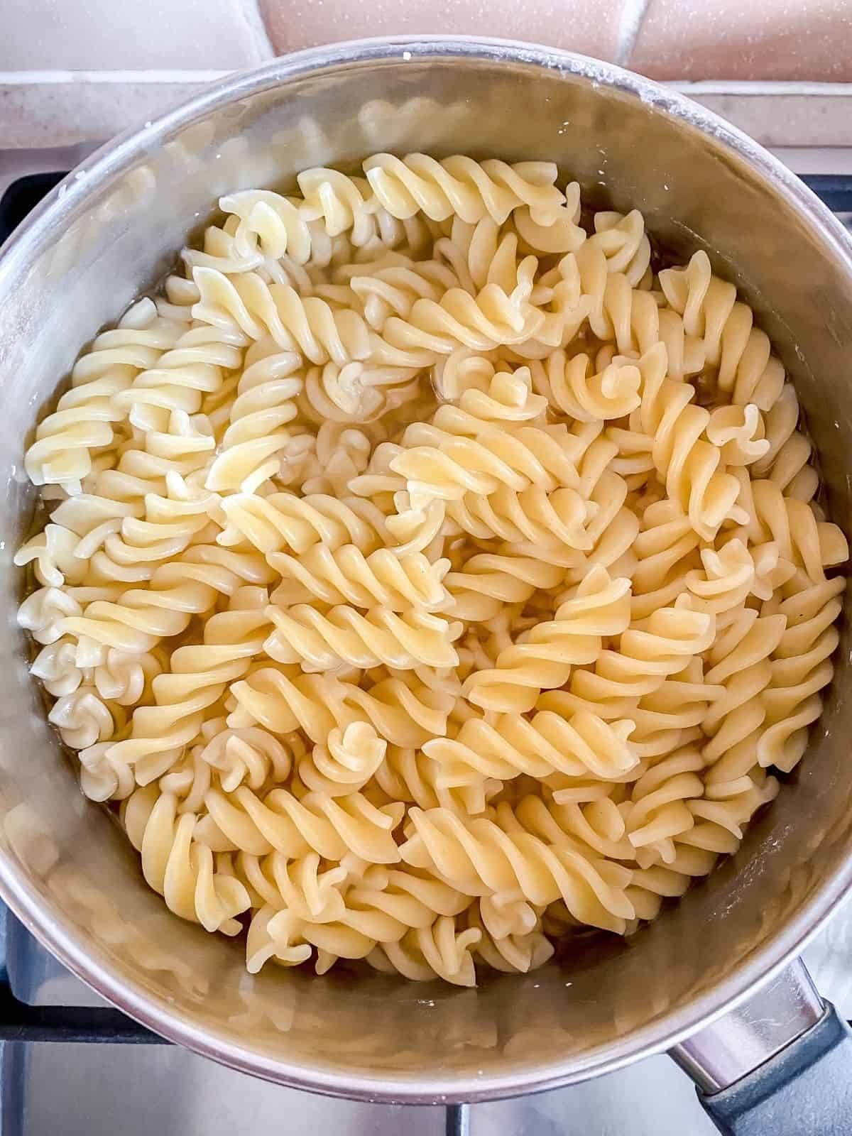 cooked pasta in a saucepan.