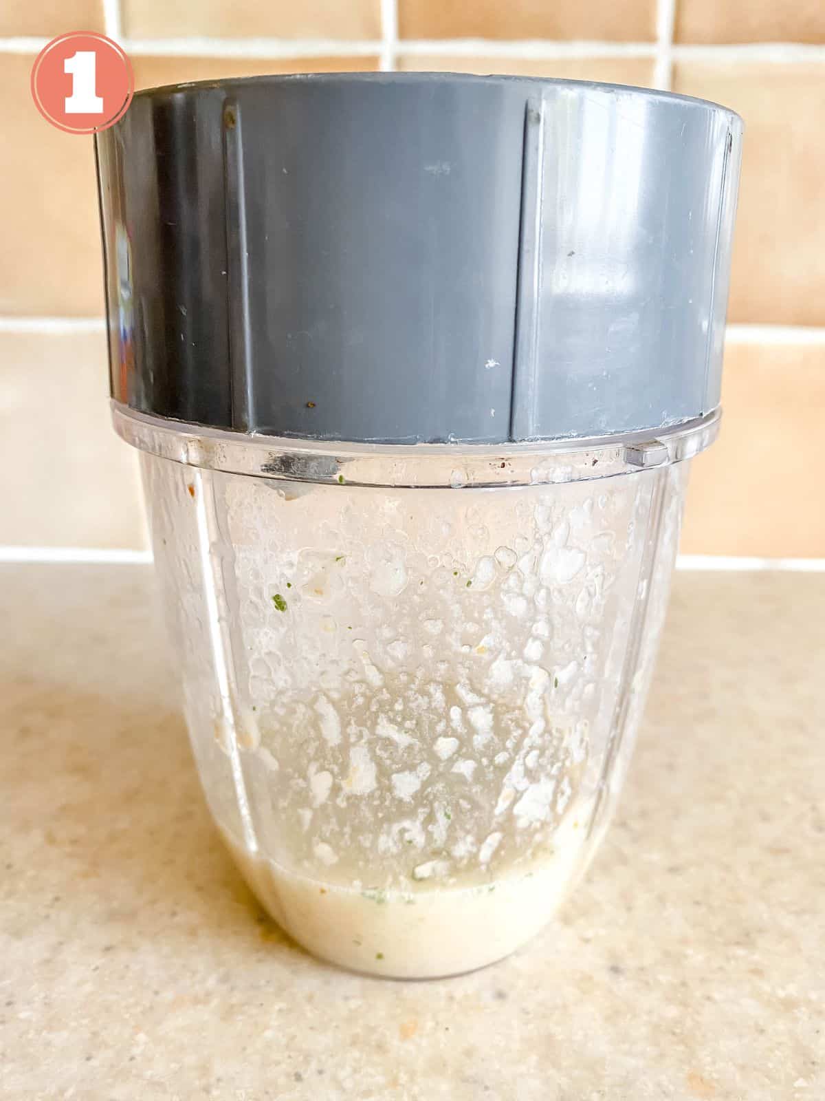 lychee puree in a blender cup.