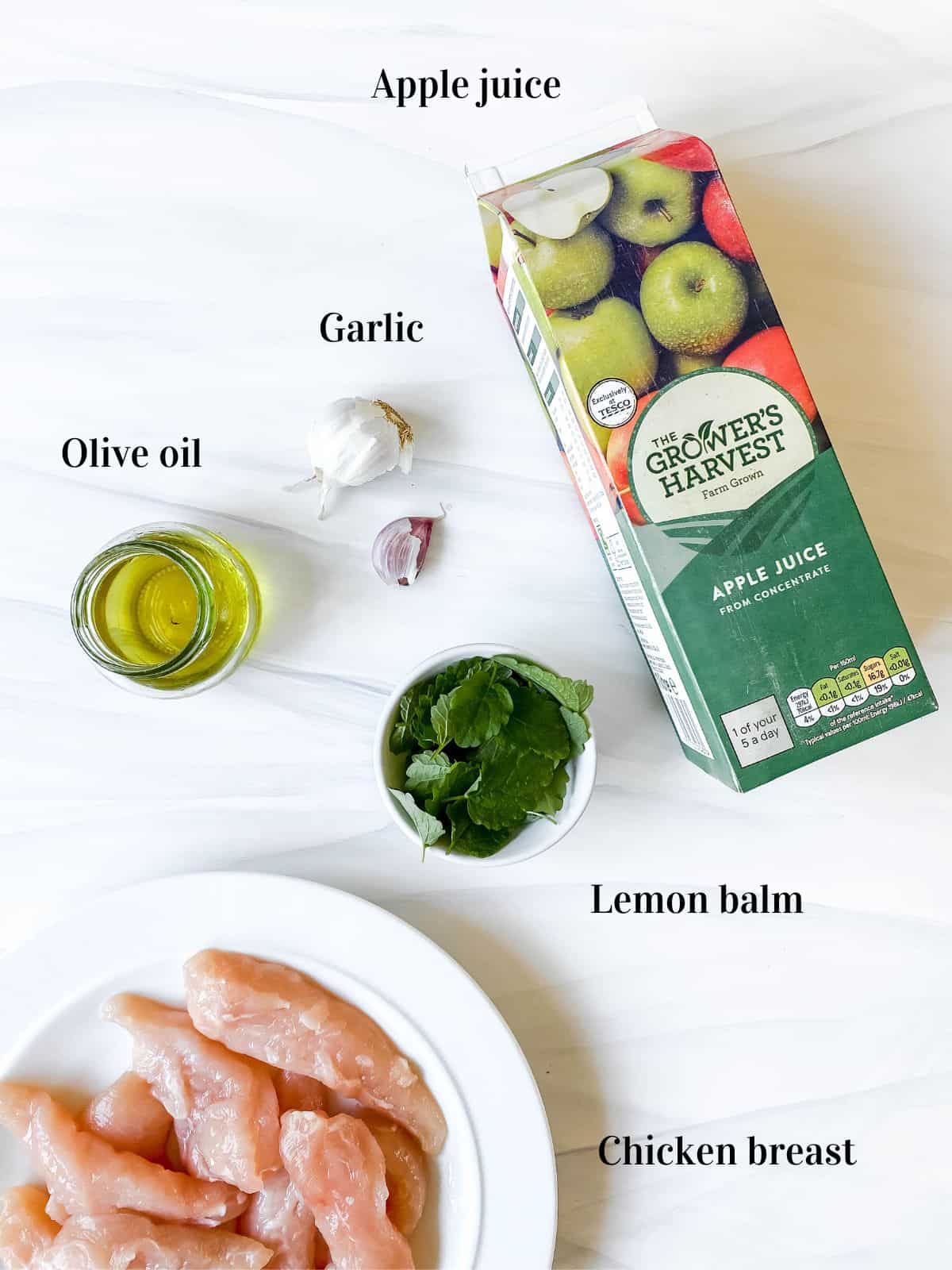 individually labelled ingredients to make lemon balm chicken including olive oil, garlic and apple juice.
