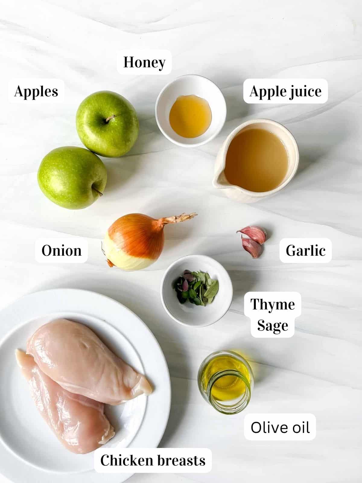 individually labelled ingredients to make Baked chicken with apples and honey including chicken breasts and herbs.