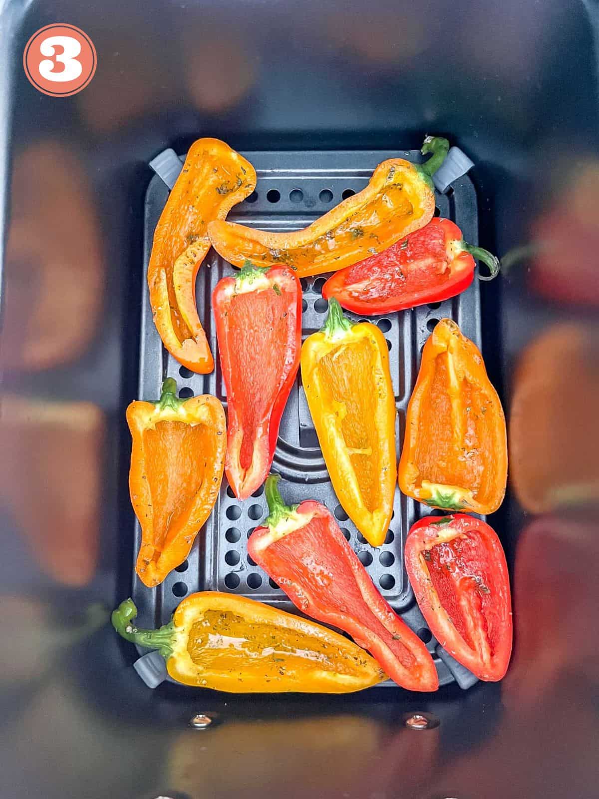 mini peppers in an air fryer basket labelled number three.