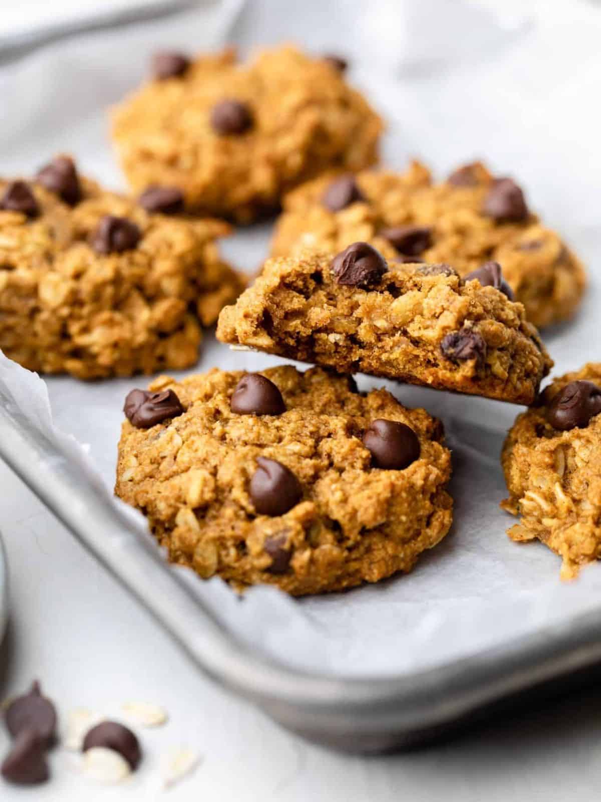 pumpkin oatmeal cookies on a baking tray.