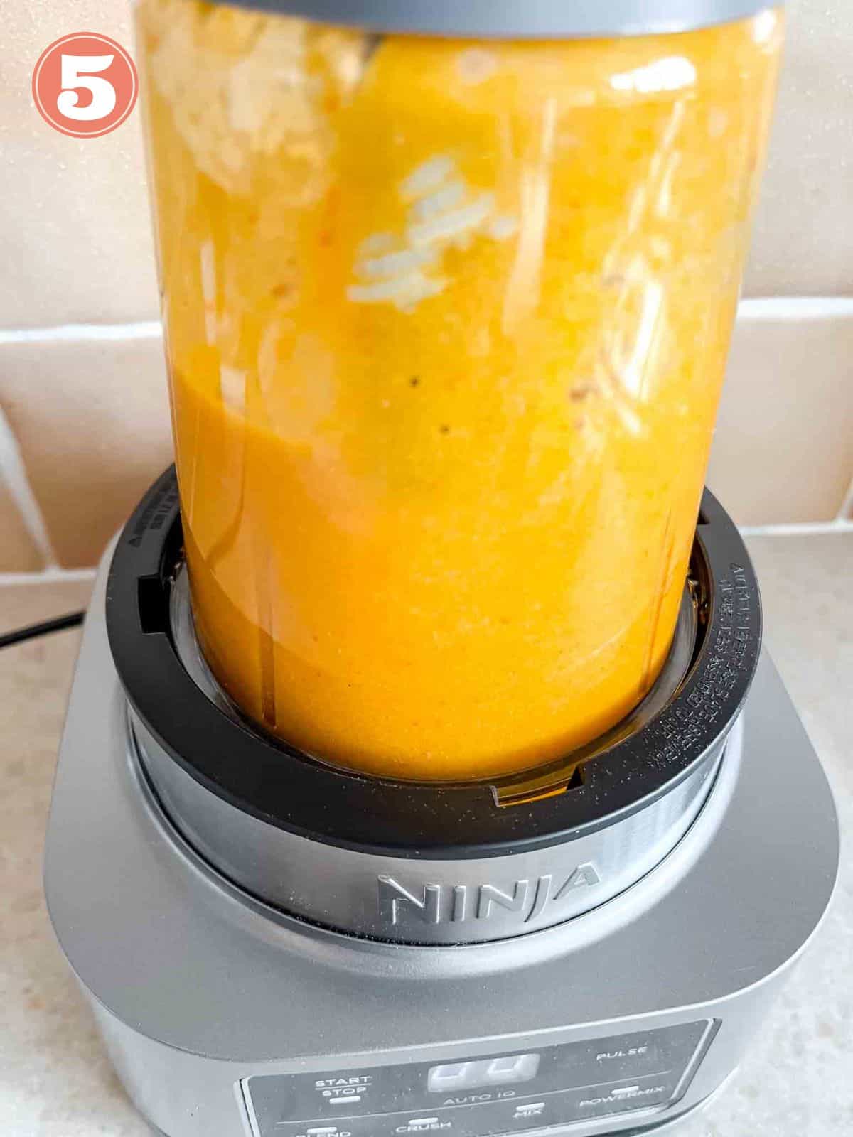 blended soup in a blender labelled number five.