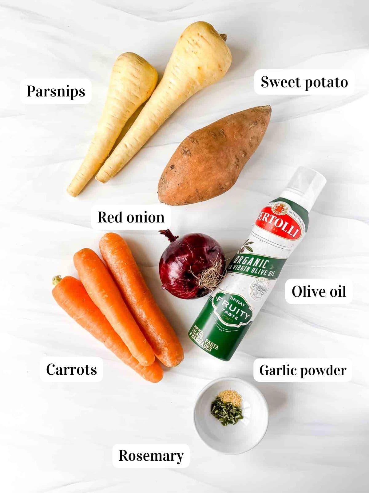 individually labelled ingredients to make air fryer root vegetables including olive oil, parsnips, carrots and red onion.