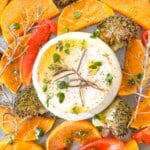 sheet pan butternut squash and ricotta with herbs on a baking sheet.