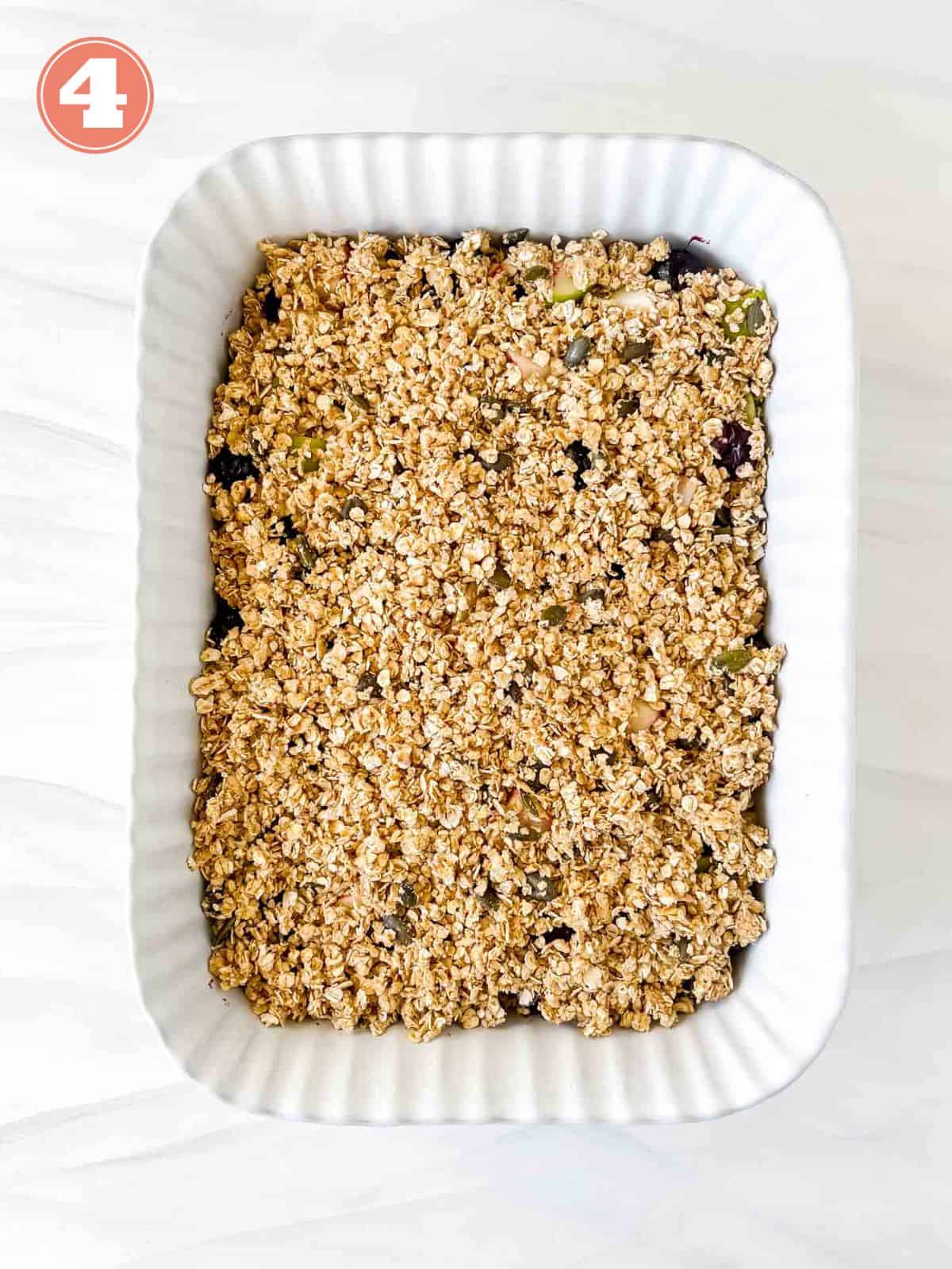 apple blueberry crisp in a baking pan labelled number four.