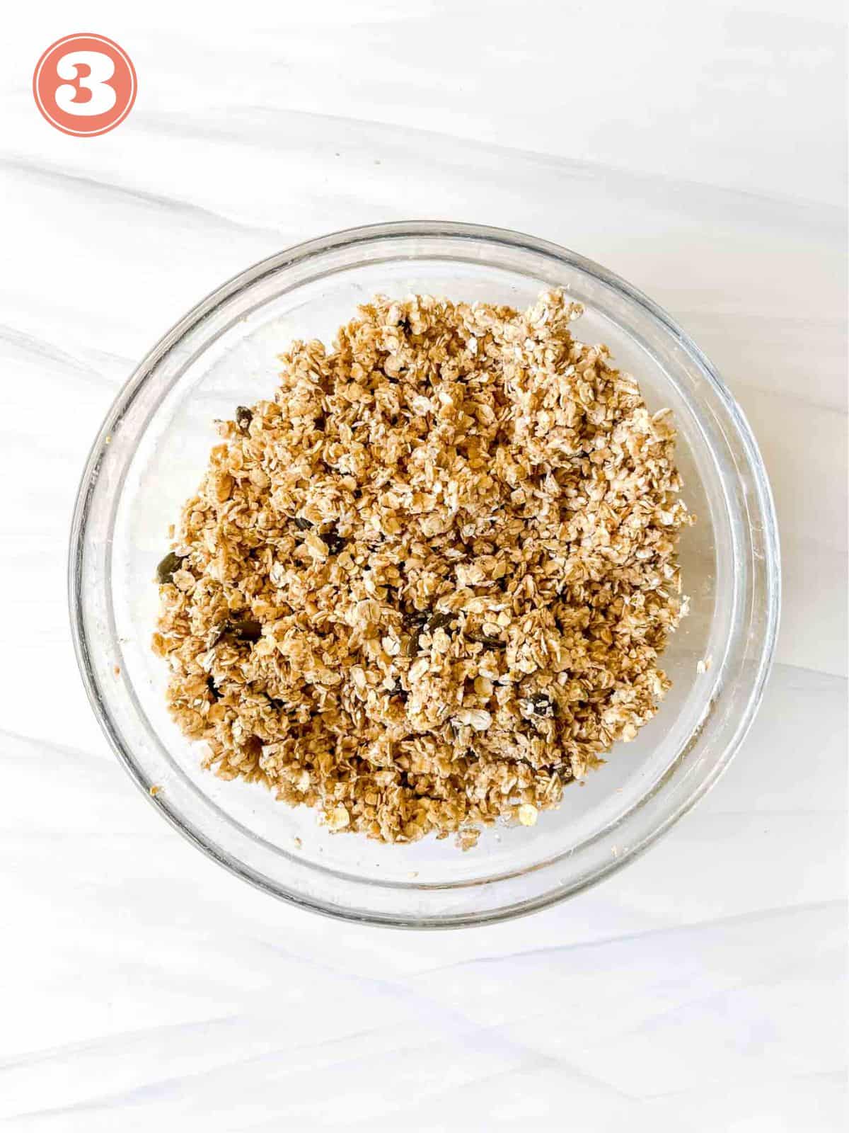 oat crisp topping ingredients in a glass bowl labelled number three.