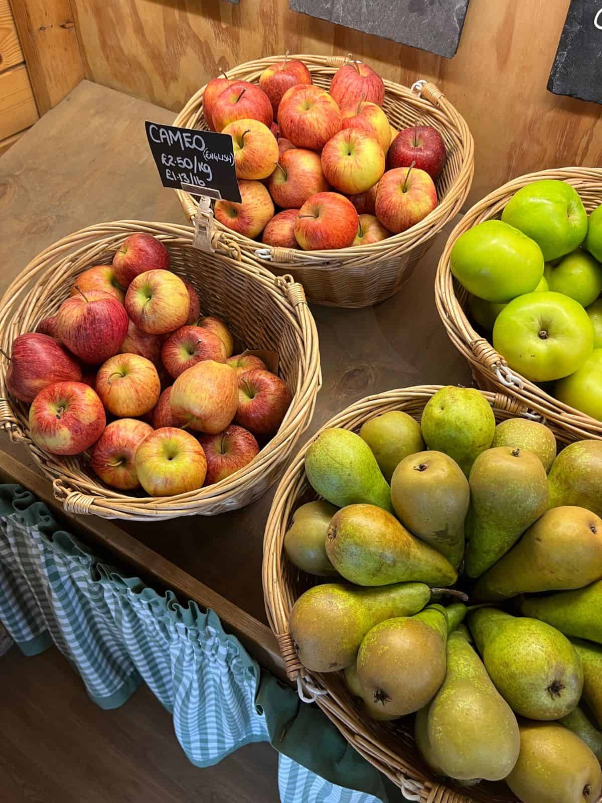 baskets of apples and pears.