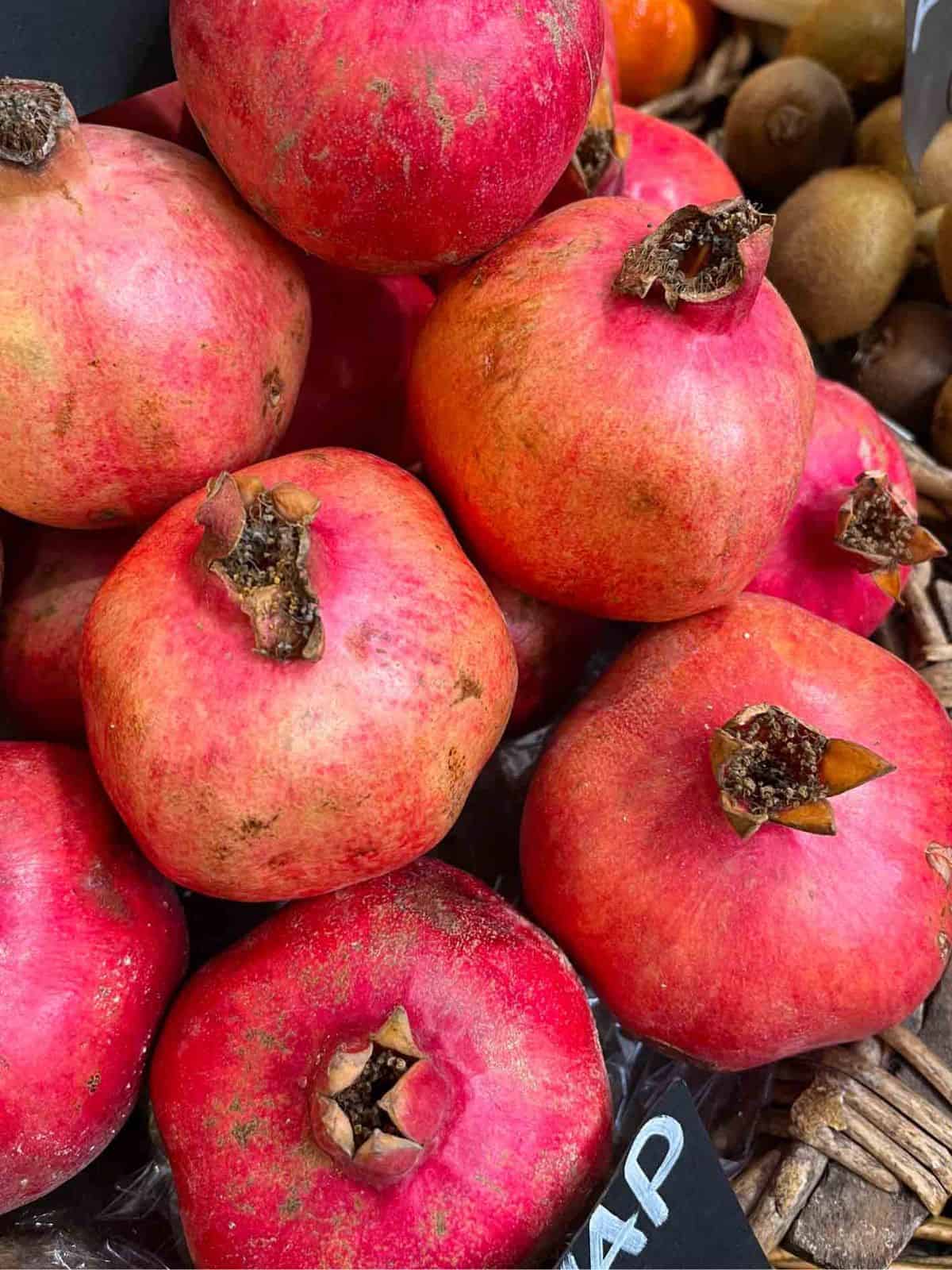 pomegranates in a basket.
