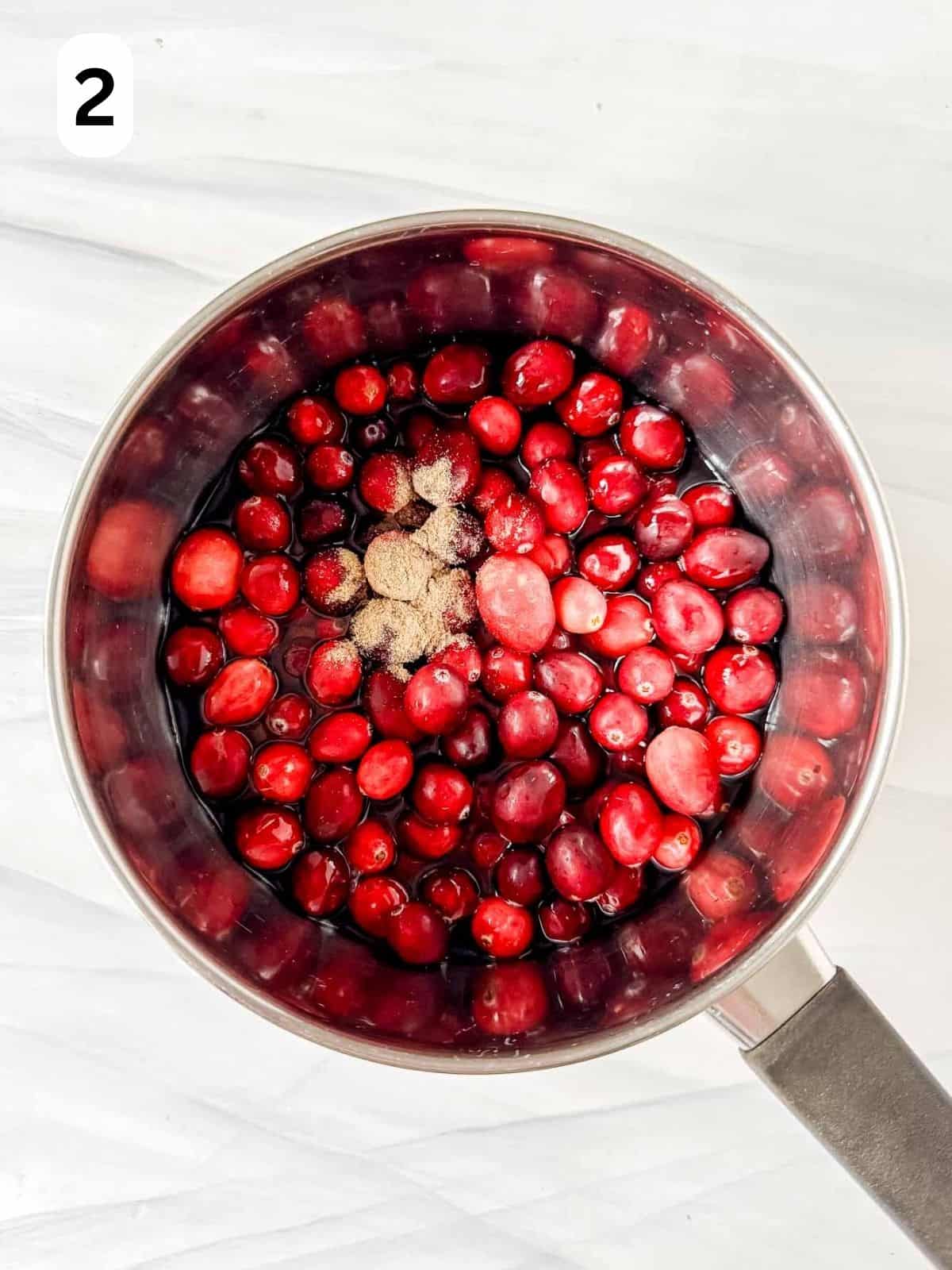 cranberries and cinnamon in a pot labelled number two.