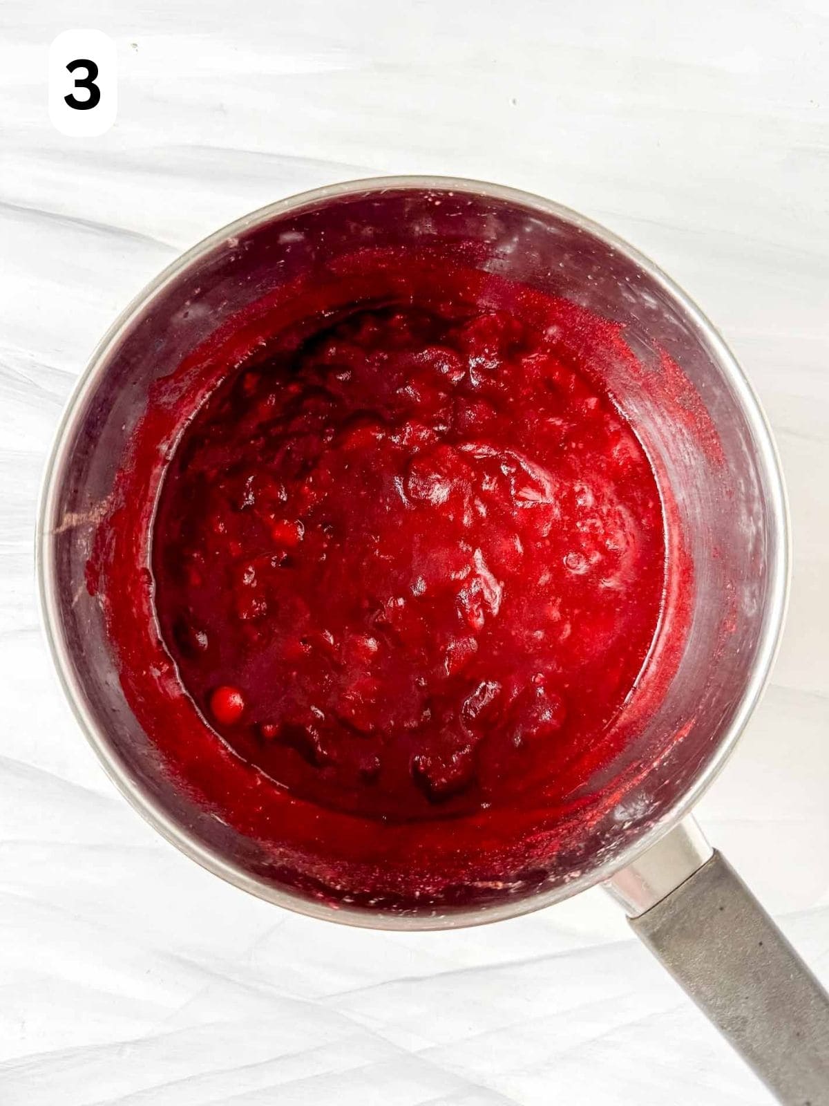 homemade cranberry sauce in a pot labelled number three.