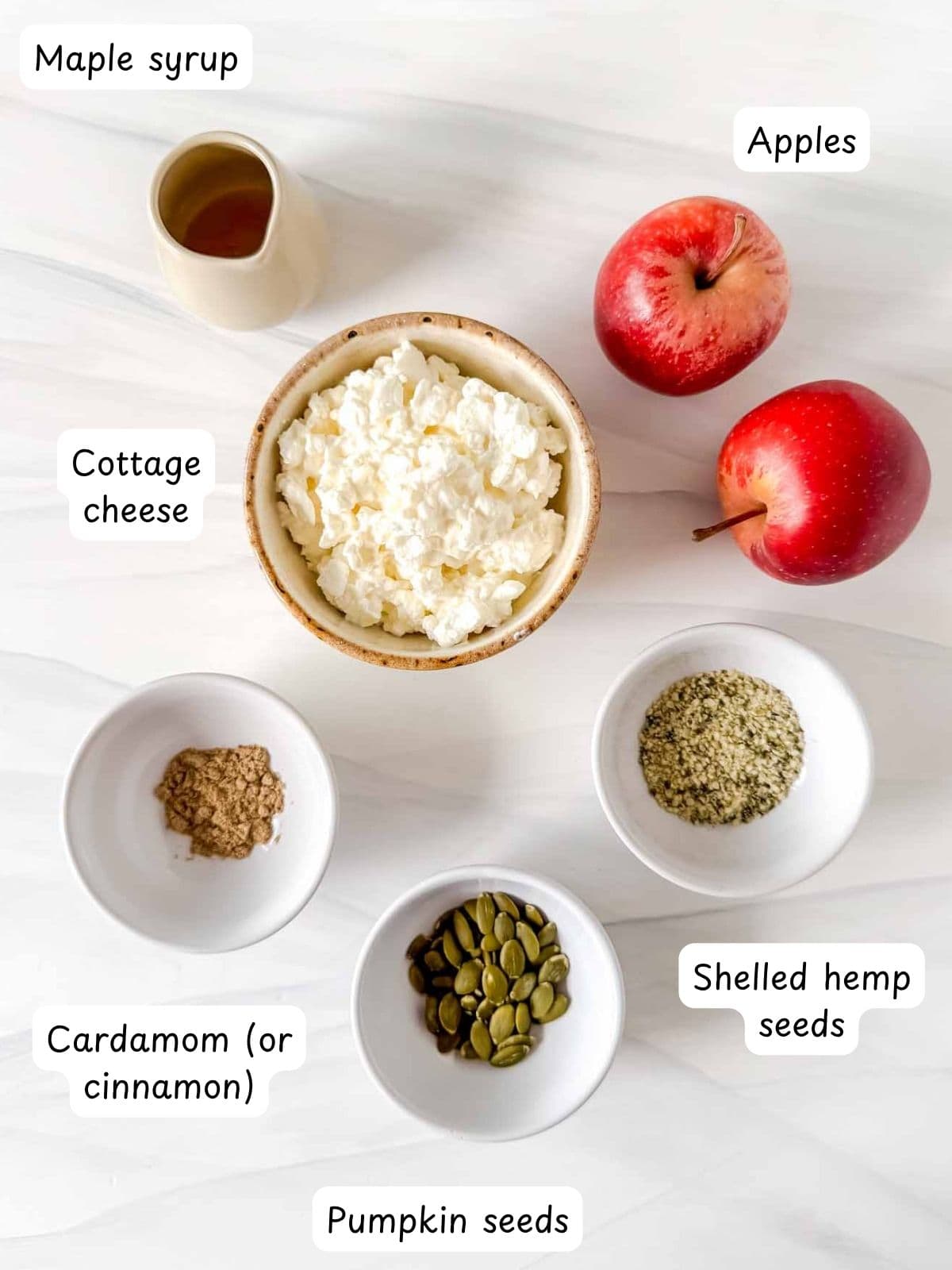 individually labelled cottage cheese, apples, maple syrup, cardamom or cinnamon, pumpkin seeds and shelled hemp seeds.