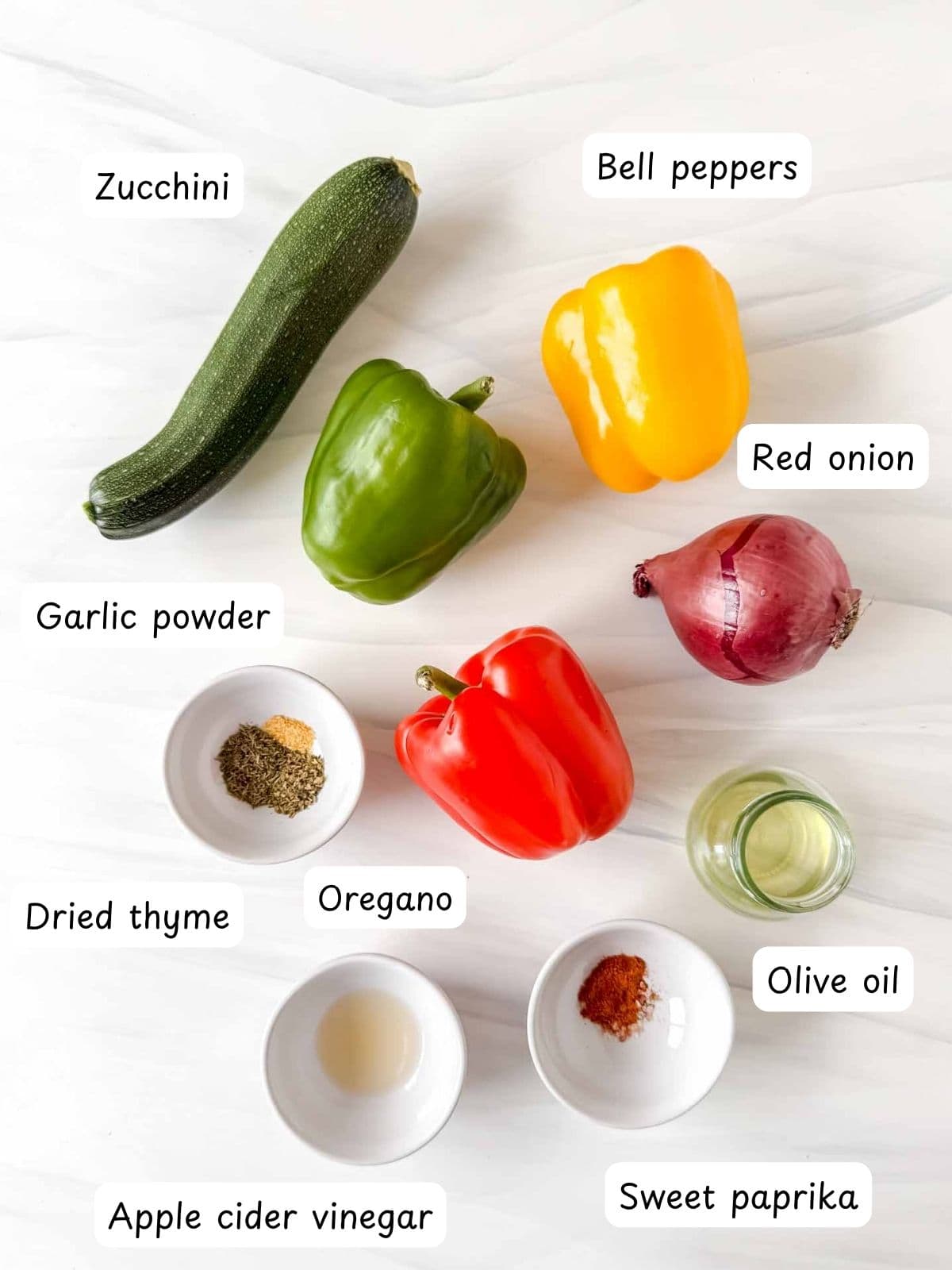 individually labelled zucchini, bell peppers, red onion, olive oil, garlic powder, oregano, dried thyme, sweet paprika and apple cider vinegar.
