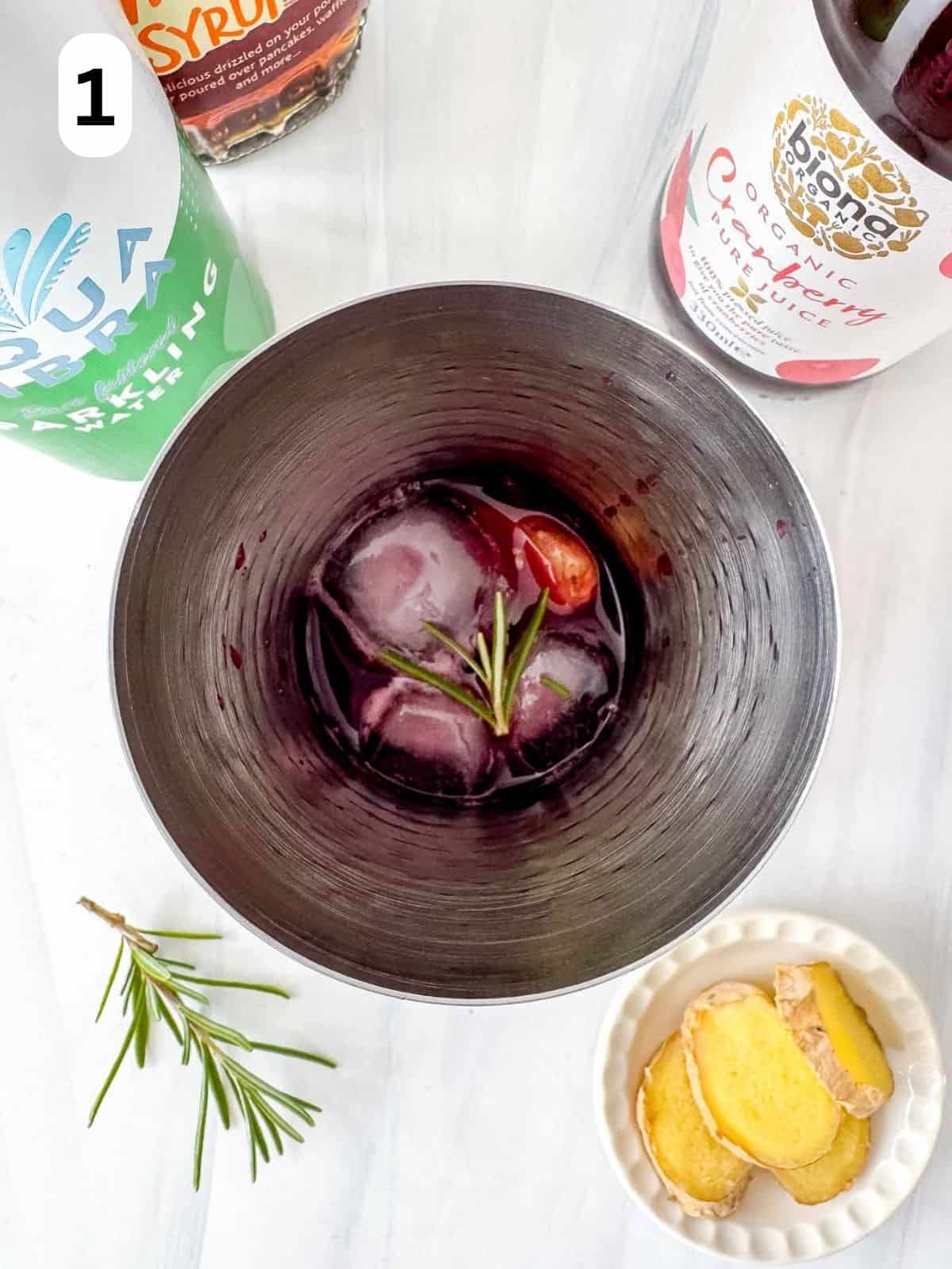 cranberry juice, ginger, rosemary and ice in a cocktail shaker labelled number one.