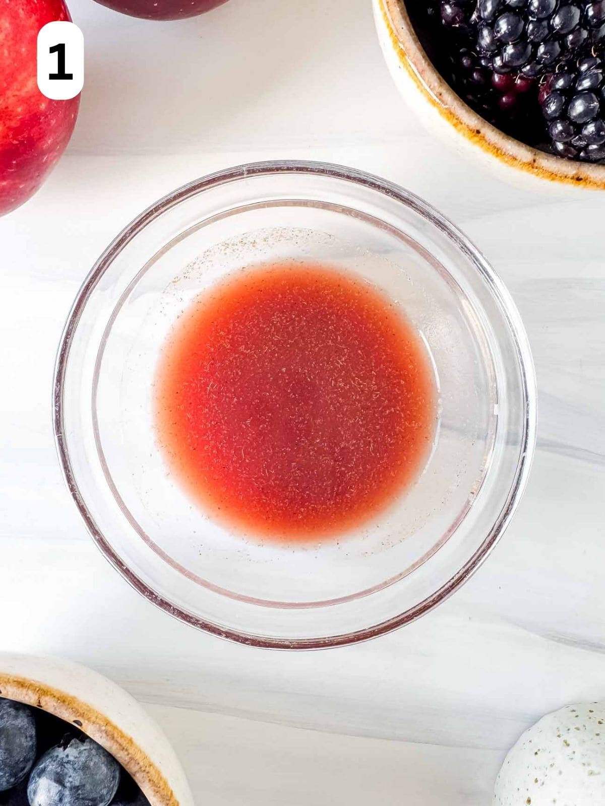 pomegranate juice in a glass bowl labelled number one.