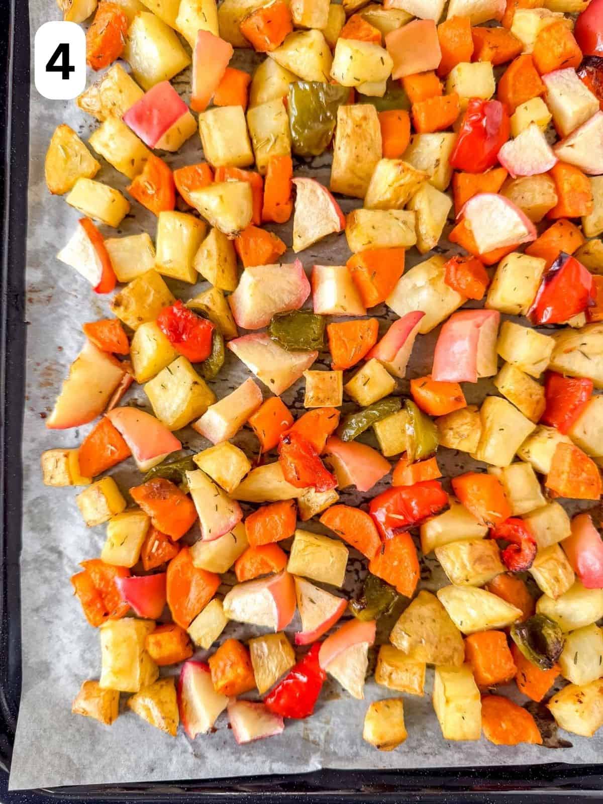 potato and sweet potato hash on a sheet pan labelled number four.