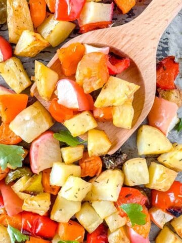 sweet potato and potato hash on a sheet pan.