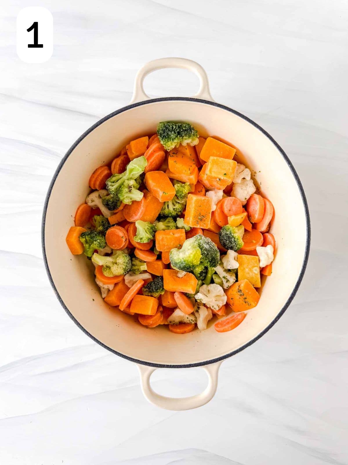 frozen mixed vegetables in a large soup pot labelled number one.