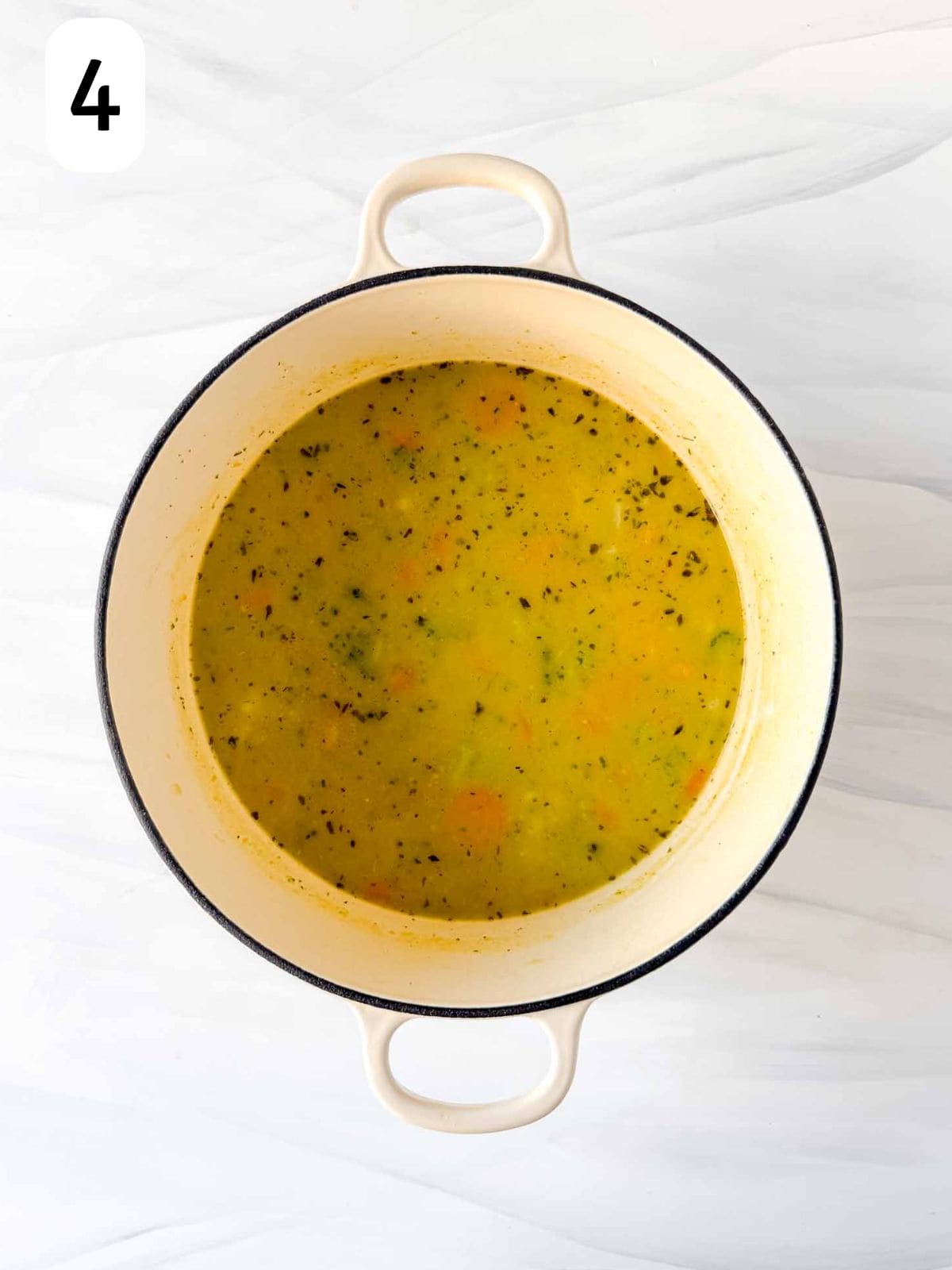 vegetable soup made with frozen vegetables in a large soup pot labelled number four.