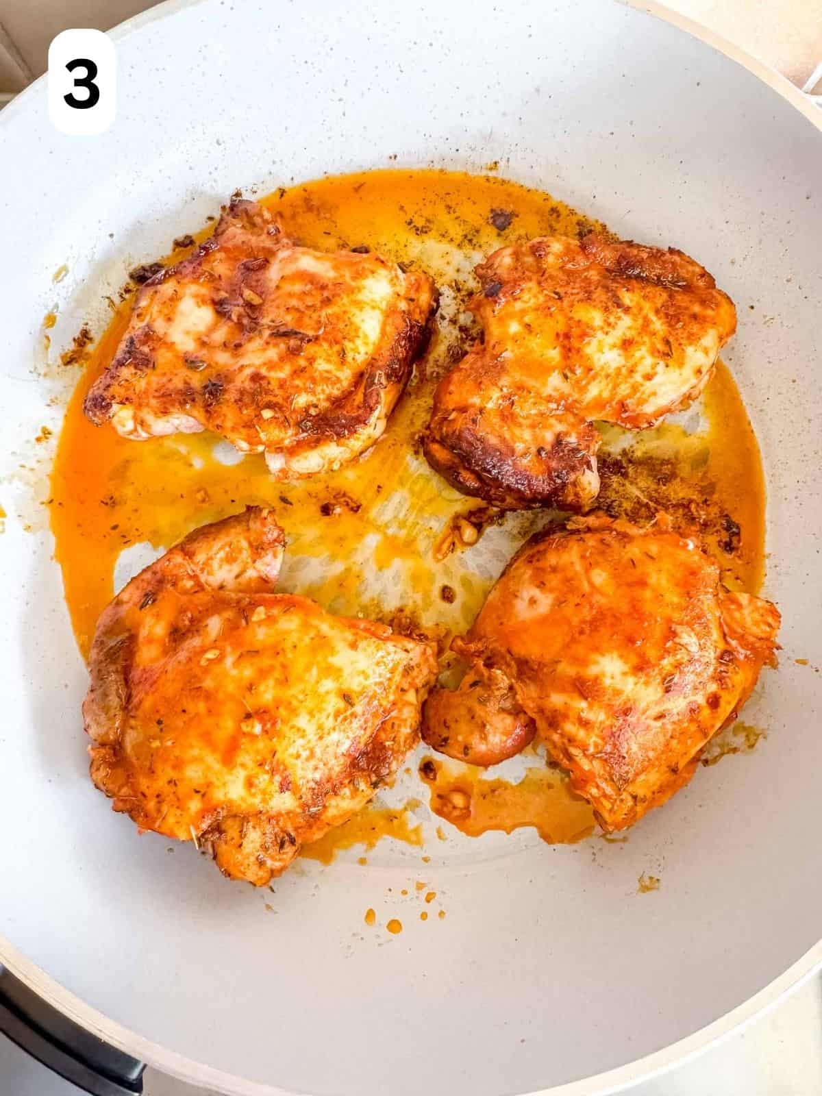 chicken thighs with paprika being cooked in a skillet labelled number three.