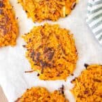 sweet potato fritters on parchment paper.