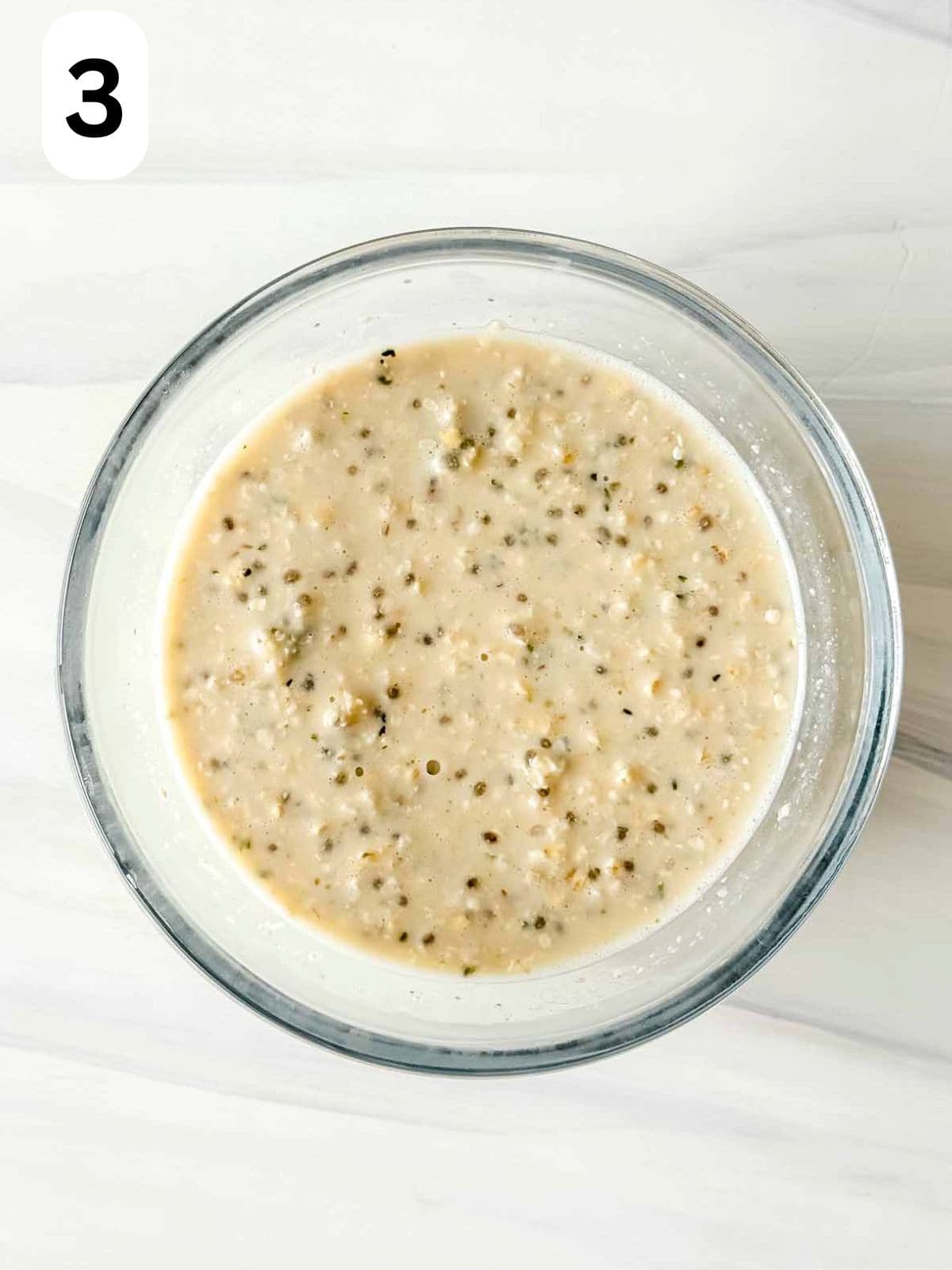 protein overnight oats in a glass bowl labelled number three.
