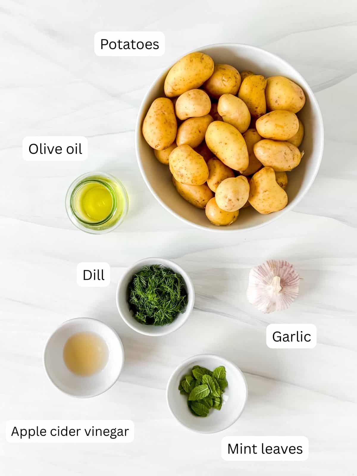 individually labelled potatoes, olive oil, mint, dill, garlic and apple cider vinegar.