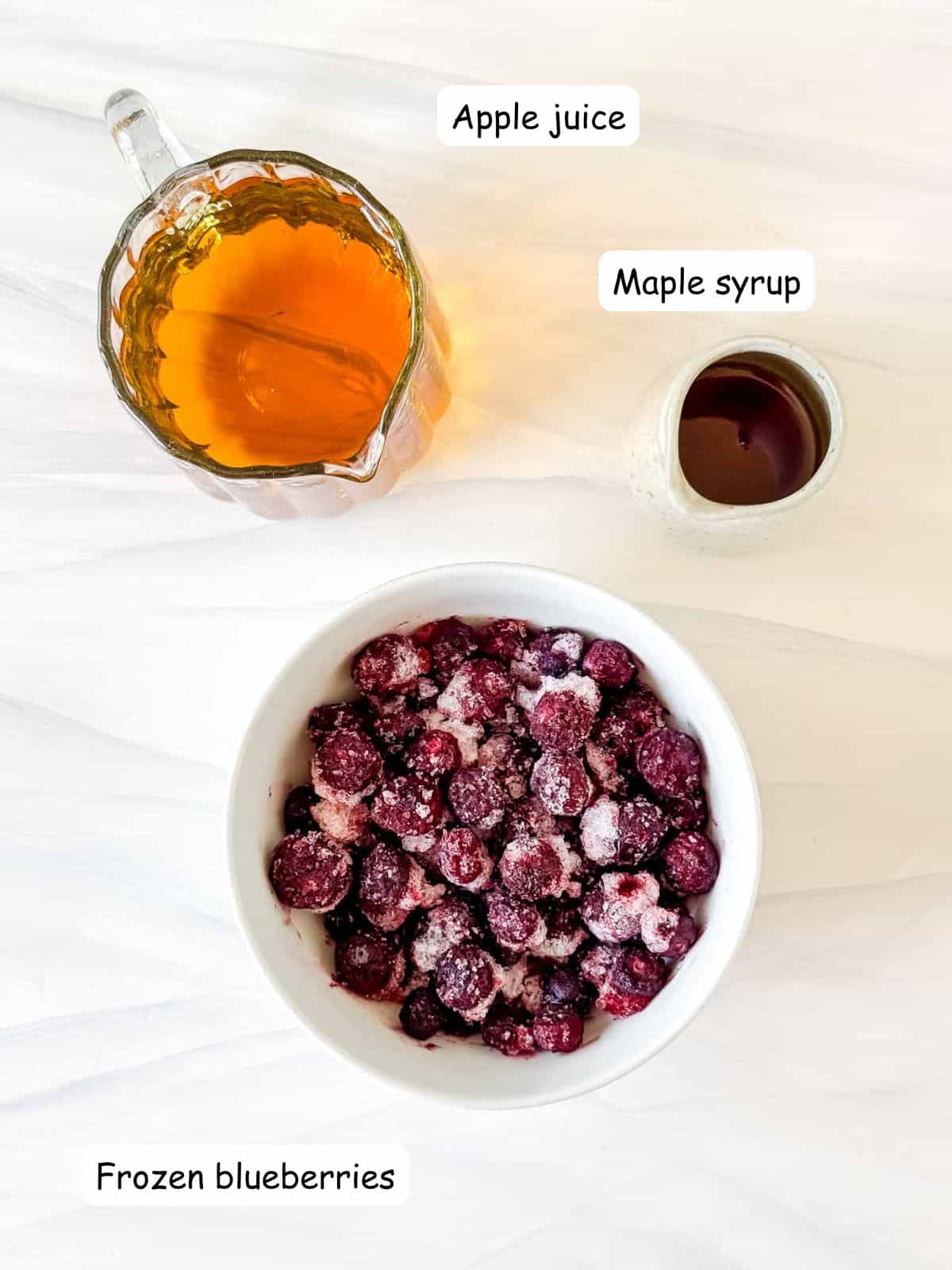 individually labelled frozen blueberries, apple juice and maple syrup.