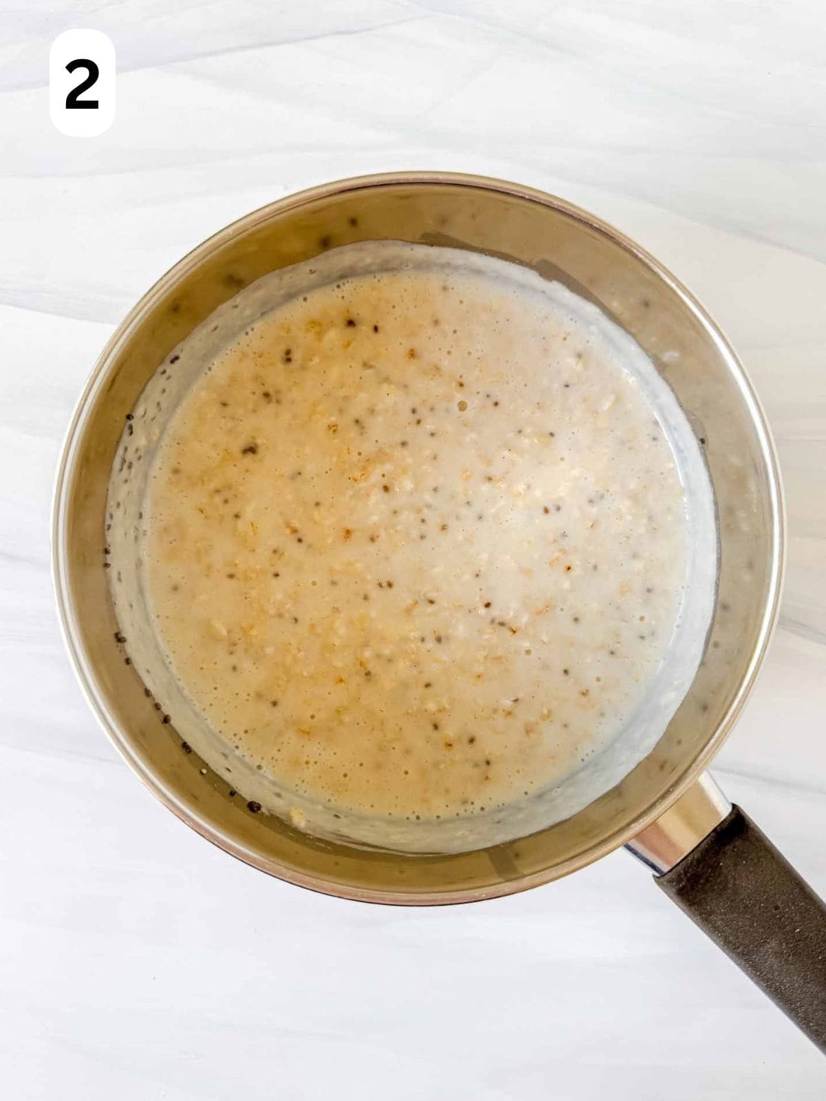 ginger oatmeal in a pot labelled number two.
